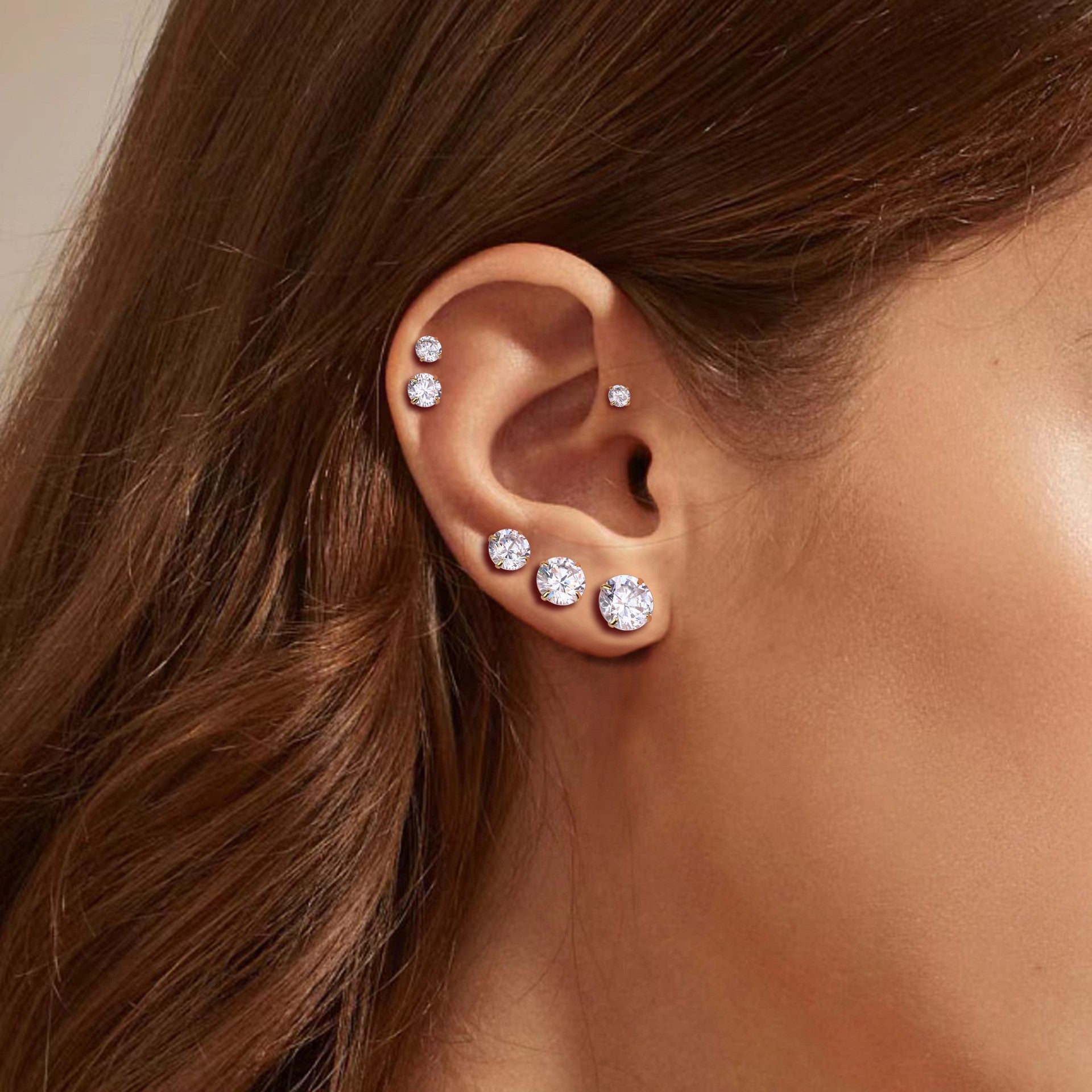 4-prong round cz stud earrings with ball screw back - multi-piercing ear look