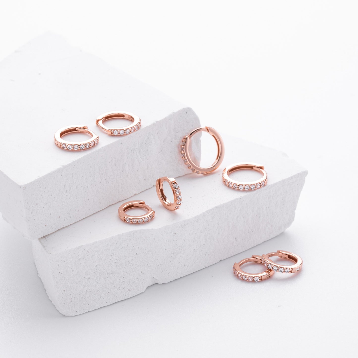 Rose gold plated cz huggie hoop earrings collection