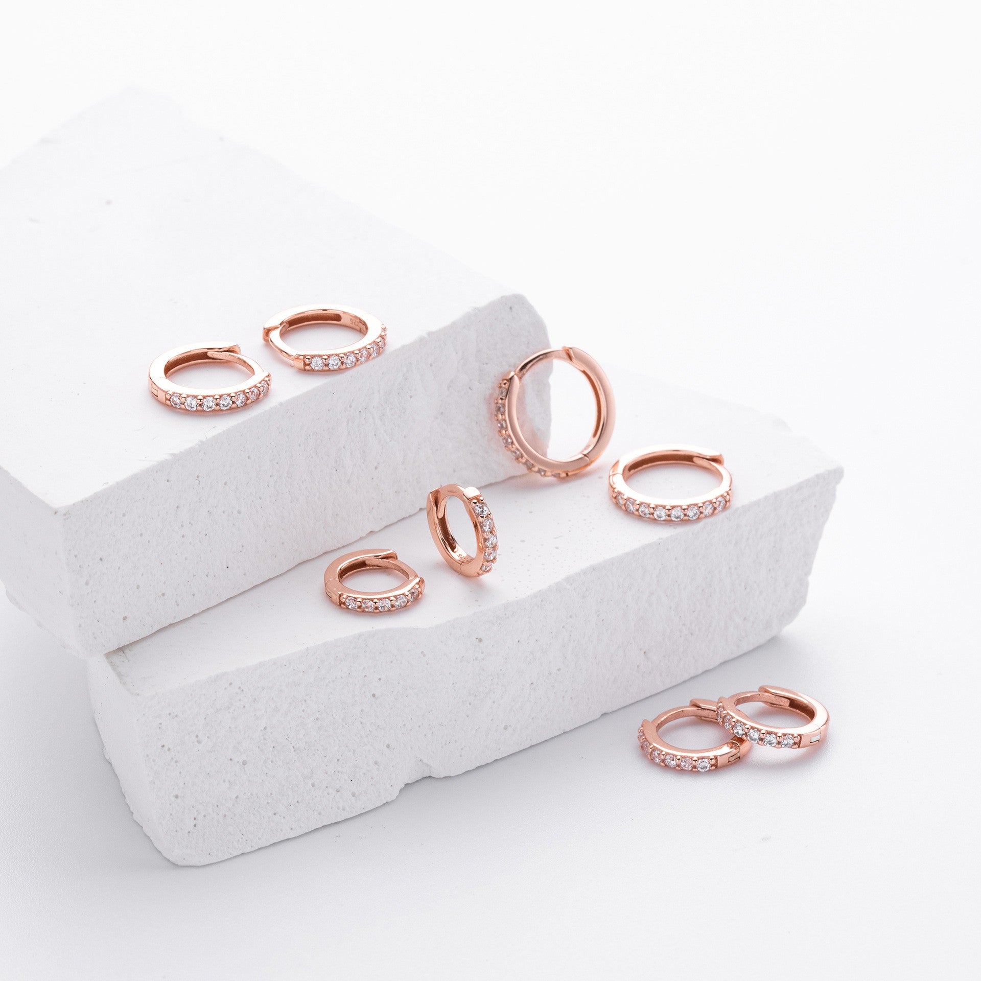 Rose gold plated cz huggie hoop earrings collection