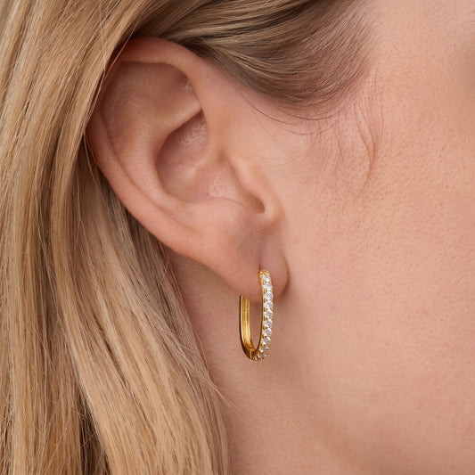 CZ oval hoop earrings - worn on ear