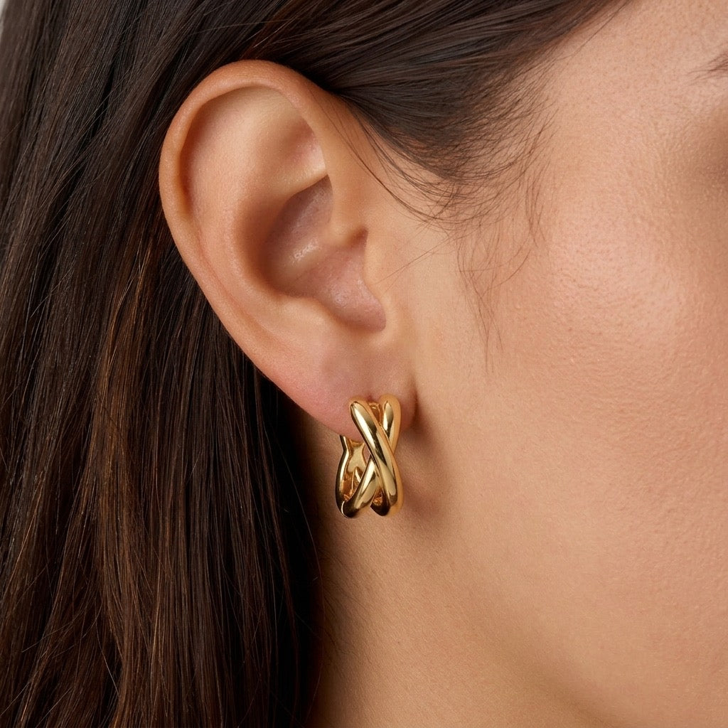 Crisscross twisted huggie hoop earrings - worn on ear
