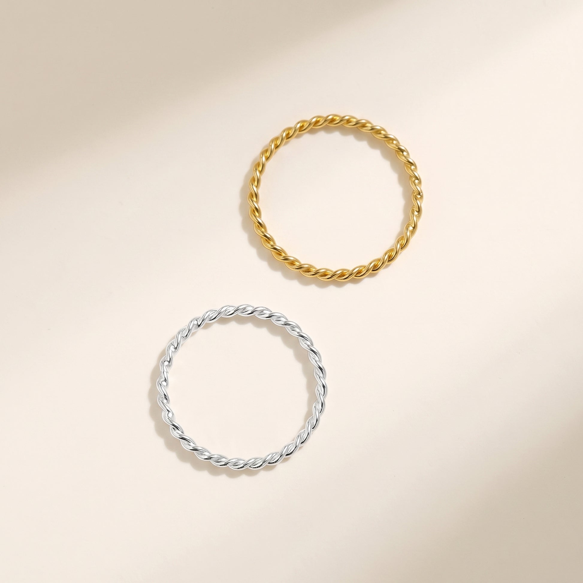 Twisted rope ring set in gold and silver tones