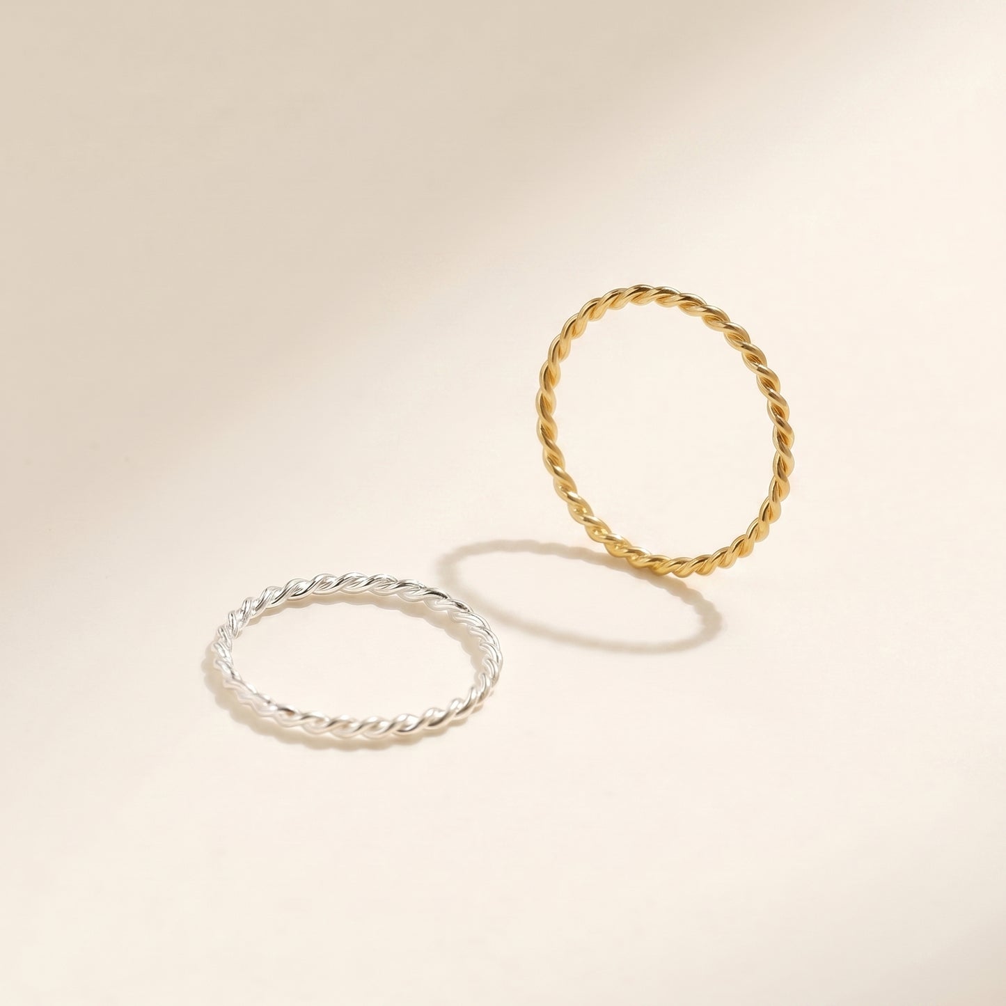 Gold and silver twisted rope ring comparison