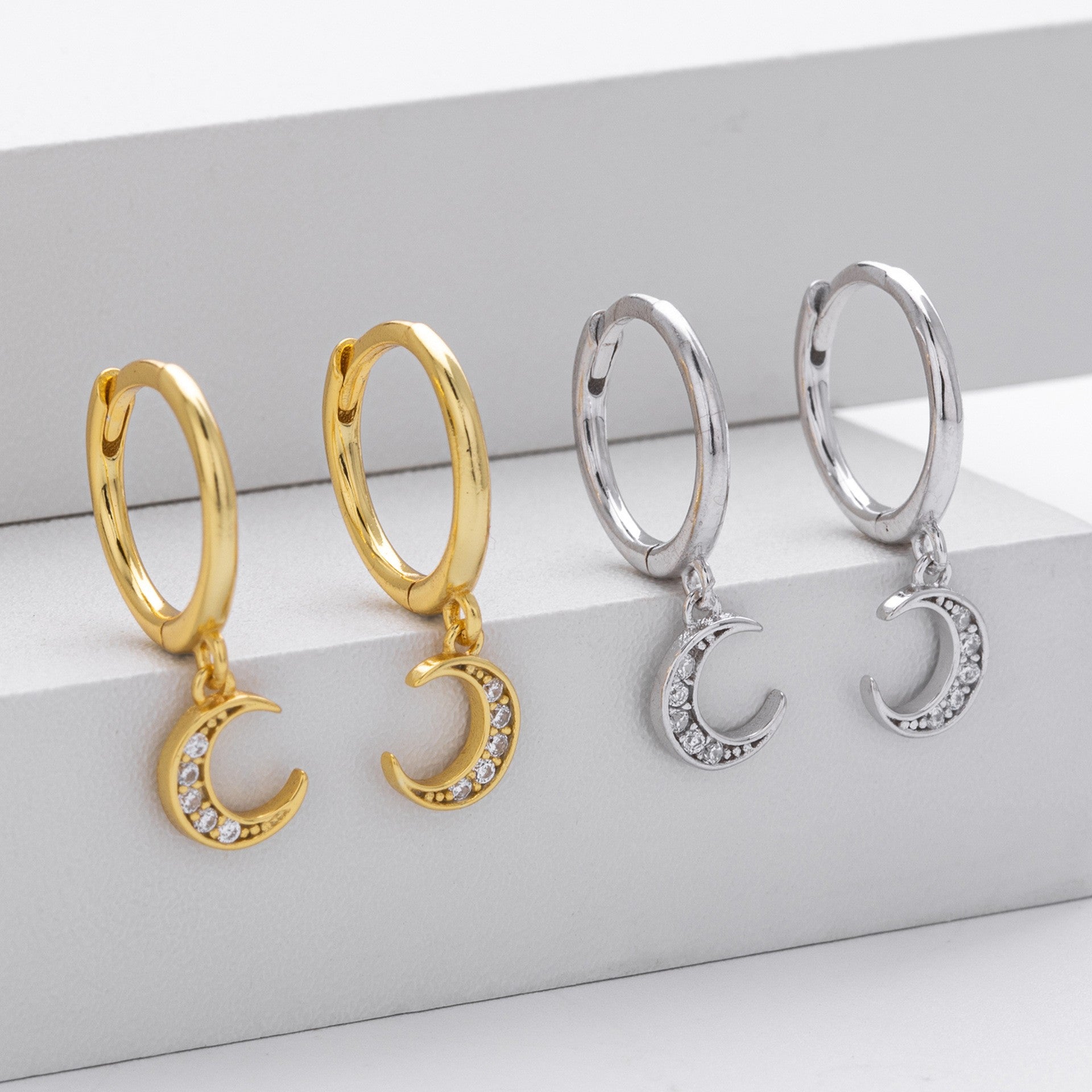 Gold and silver crescent moon cz drop hoop earrings collection