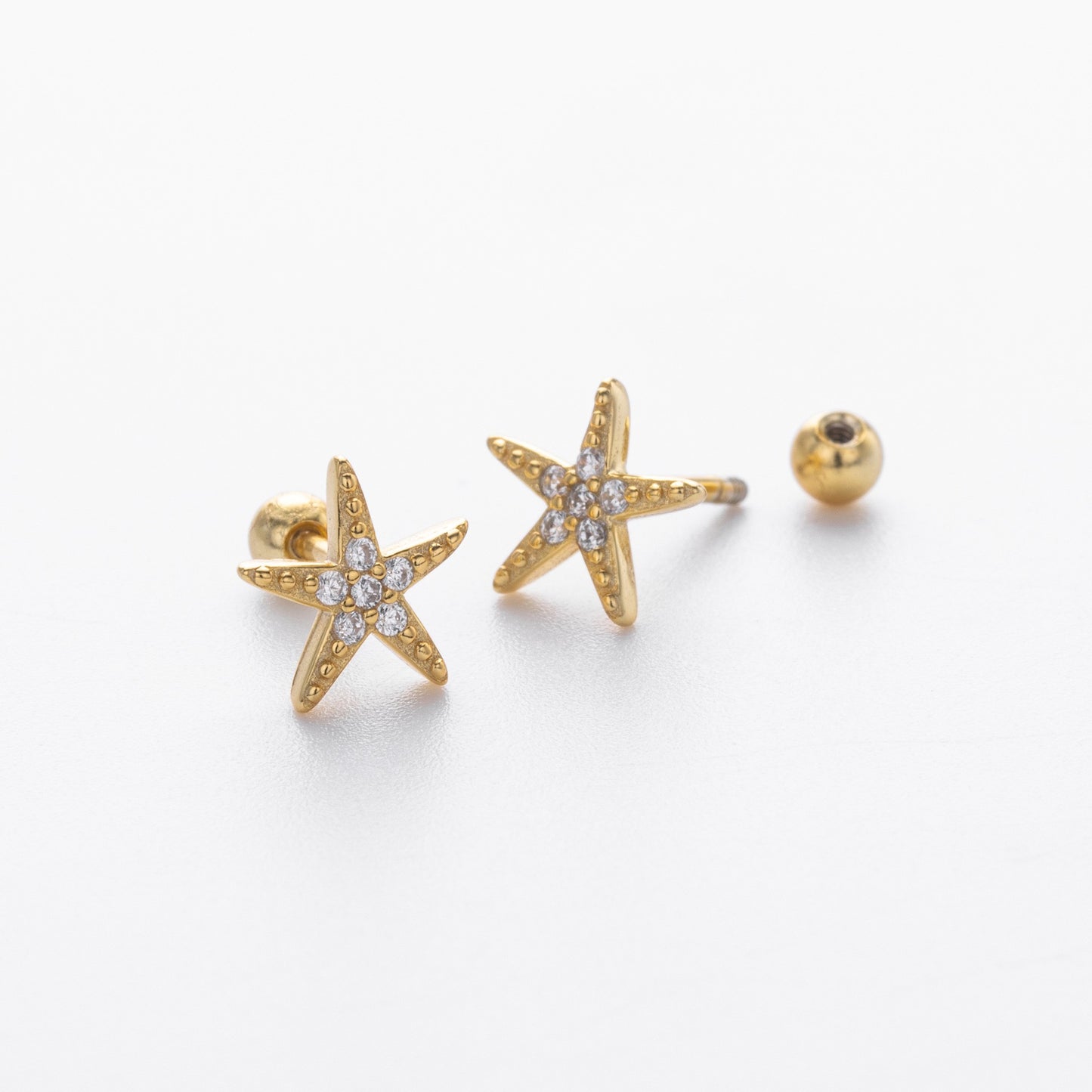 Gold and silver cz starfish stud earrings comparison