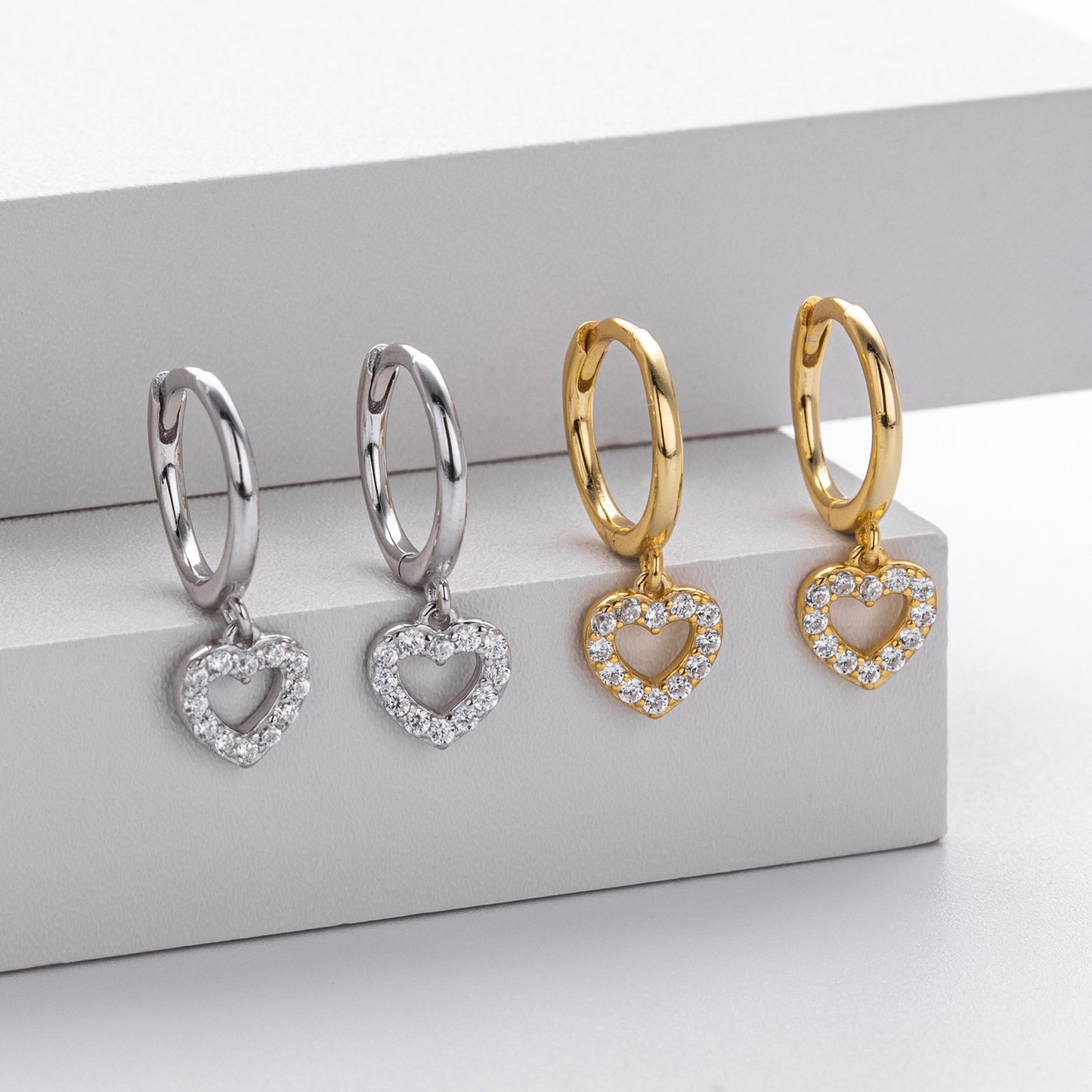 Gold and silver hollow heart cz drop hoop earrings collection