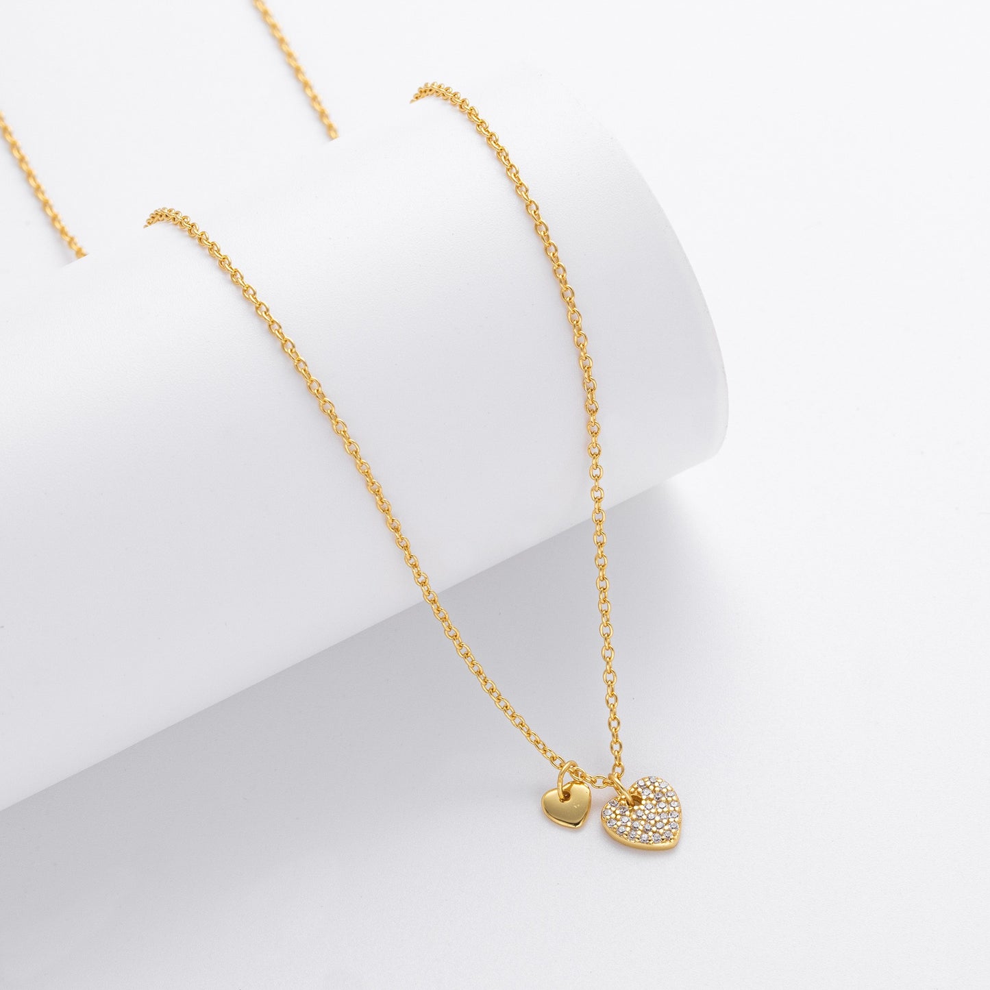Gold plated dual heart pave cz necklace - side view