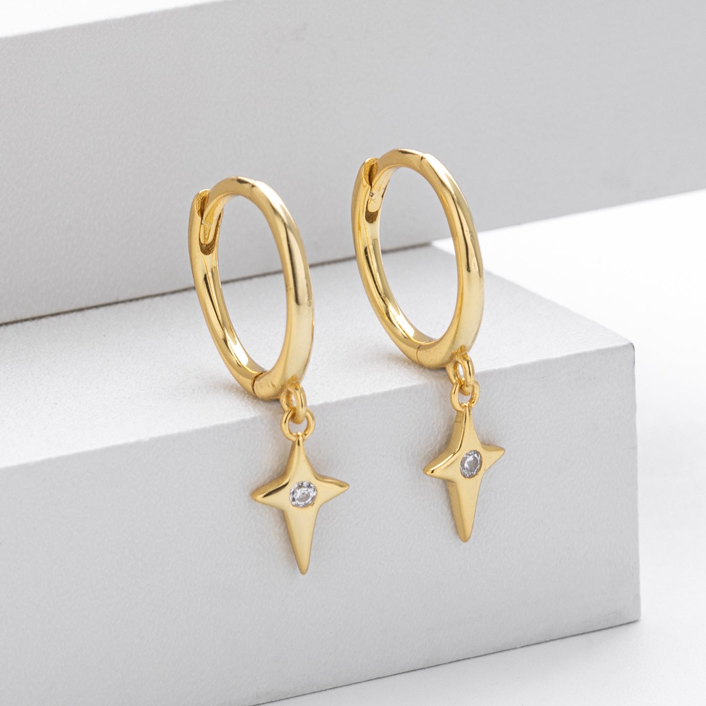 Gold plated north star cz drop hoop earrings - side view