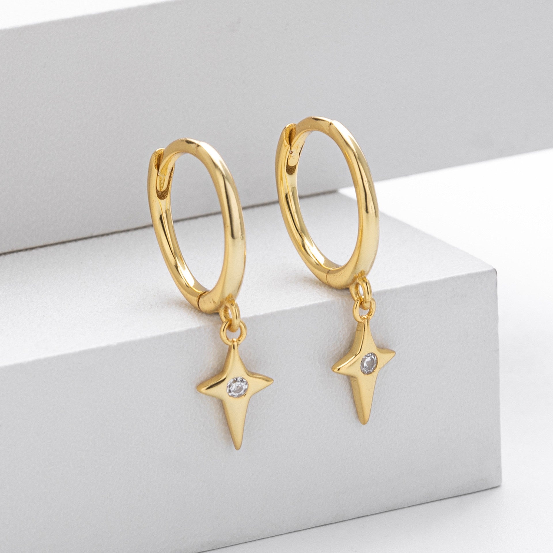Gold plated north star cz drop hoop earrings - side view