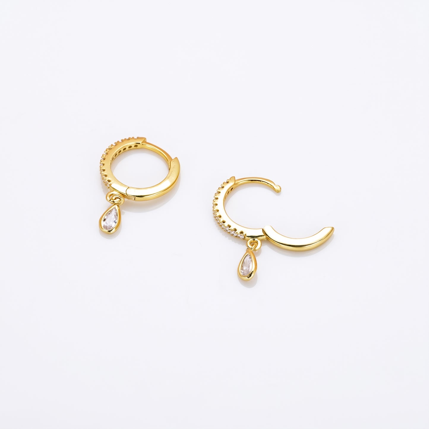 Gold plated pave teardrop cz drop hoop earrings close-up
