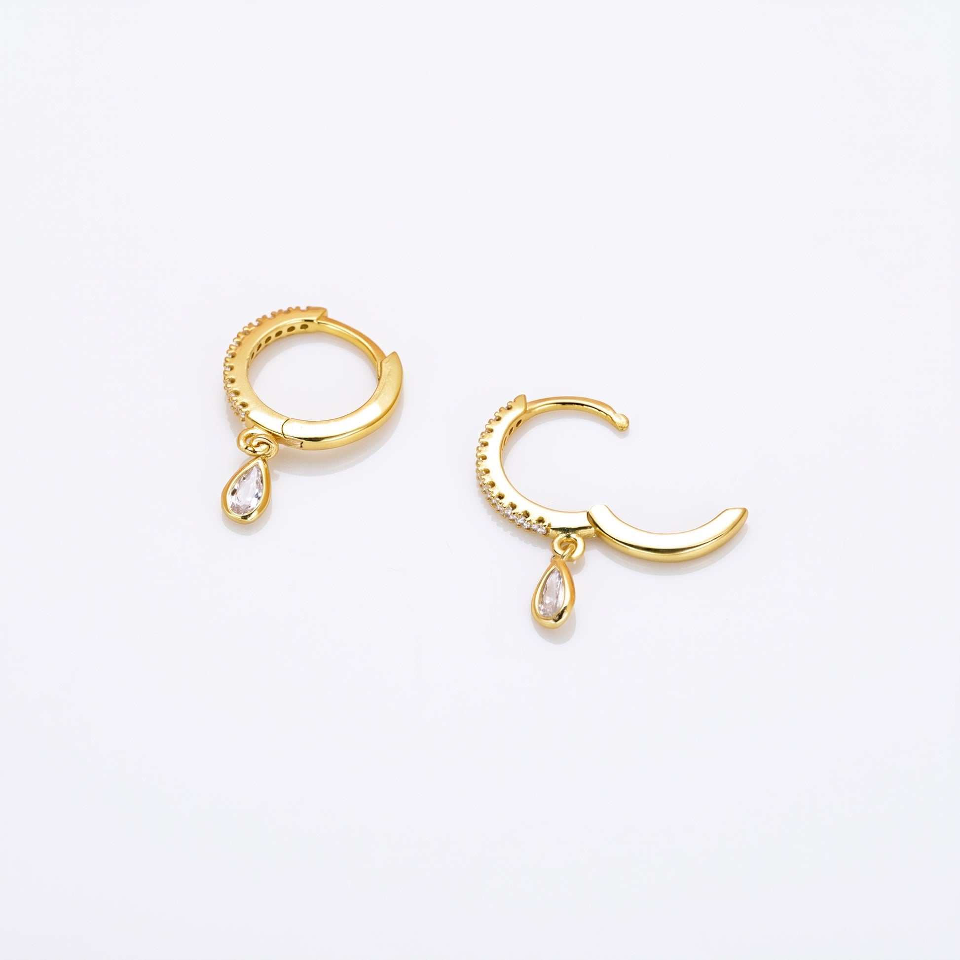 Gold plated pave teardrop cz drop hoop earrings close-up
