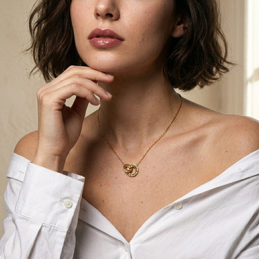 Interlocking Roman numeral cz necklace - worn on neck