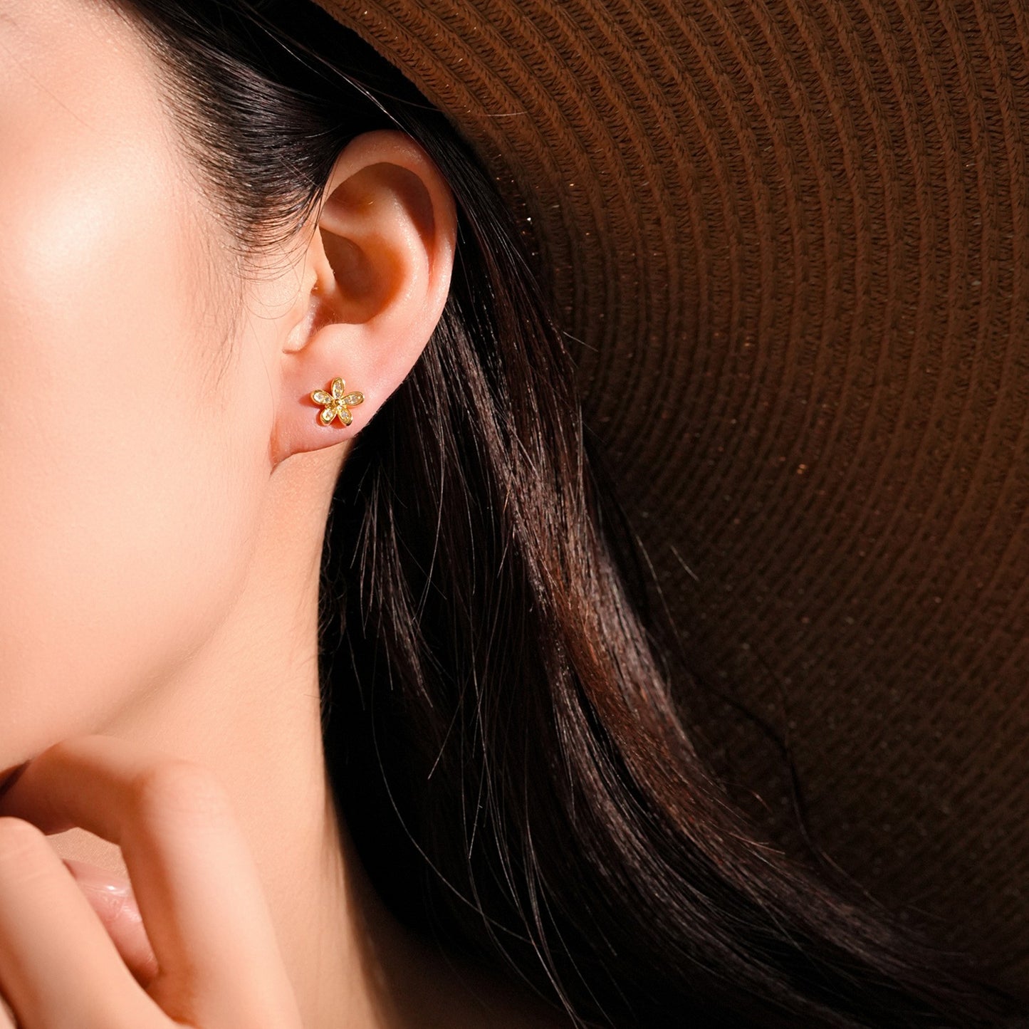 Flower cz stud earrings - worn on ear