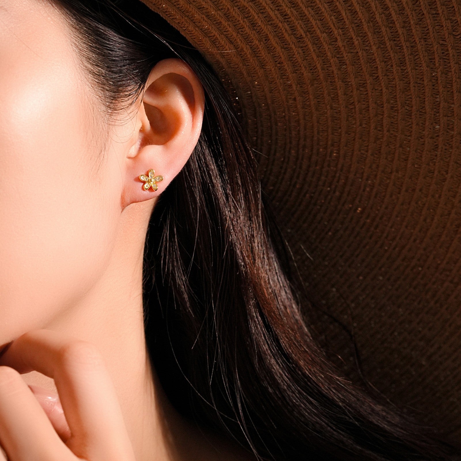 Flower cz stud earrings - worn on ear