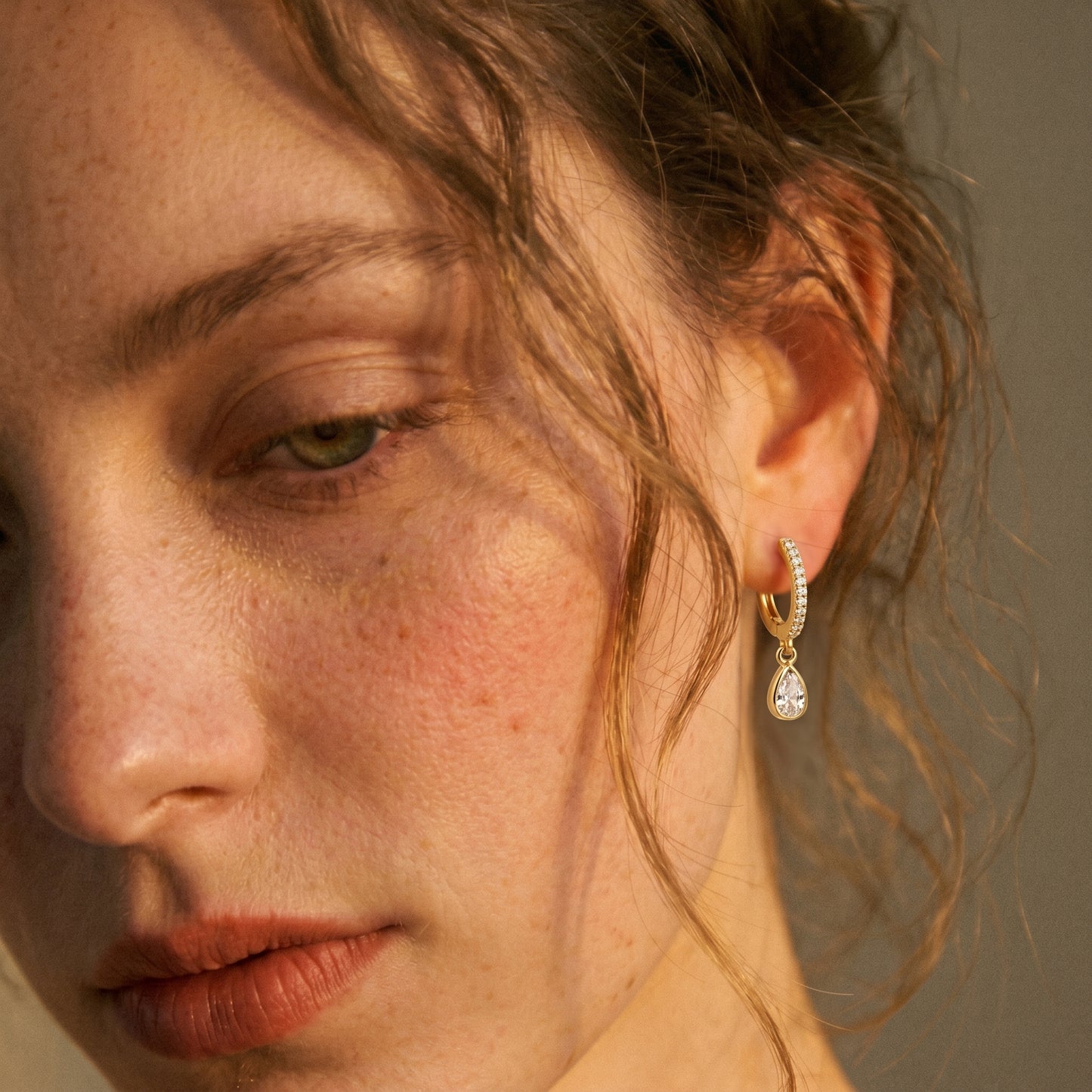 Pave teardrop cz drop hoop earrings - worn on ear