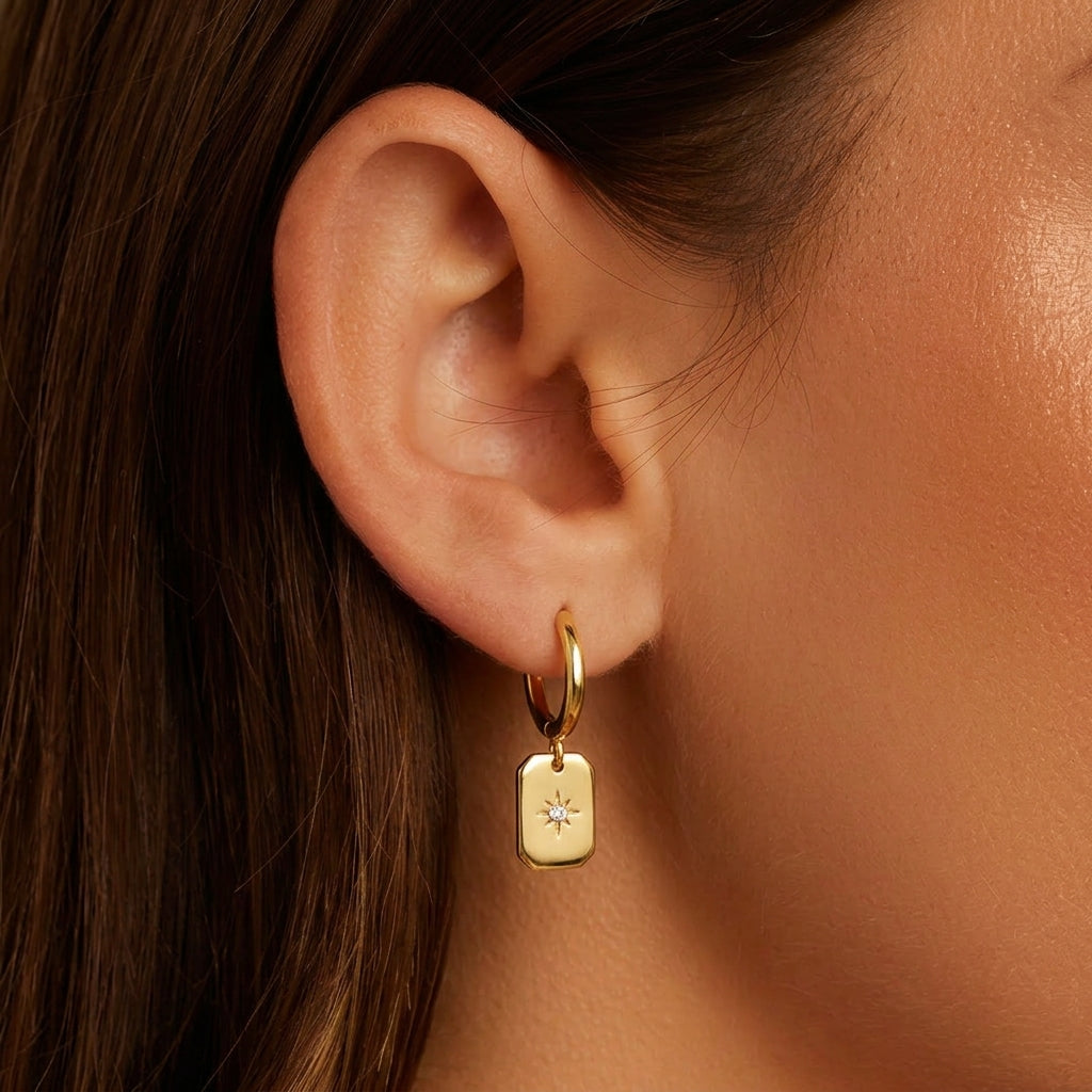 Starburst tag drop hoop earrings - worn on ear