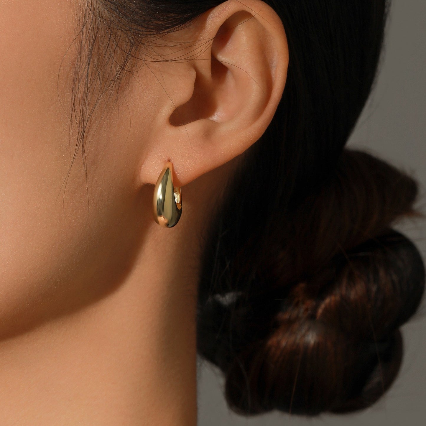 Teardrop stud earrings - worn on ear